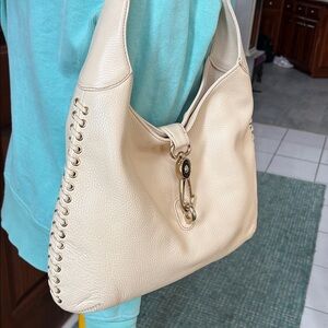 Dooney & Bourke Vintage Shoulder Bag  pebbled leather  Cream/gold tone  lace up